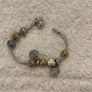 Pandora bracelet with pandora charms (gold &silver mix)